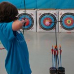 Alex practicing his bow