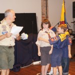 The boys receive various scouting awards