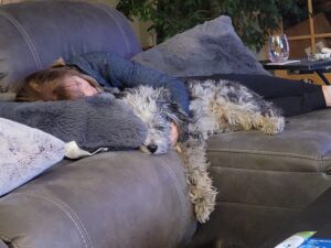 December - Michelle and 'Bravo' the dog taking a nap