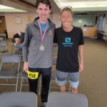 At Buena Vista 25/50 miler. Alex meets running legend Courtney Dauwalter