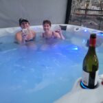 February - Sharing Hot Tub and Wine with neighbor Nancy