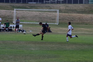 Eric booting the soccer ball!