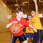 Eric driving for the basket!