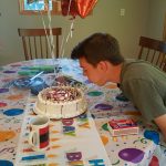 Eric's 14th birthday attempting to blow out candles that re-light!