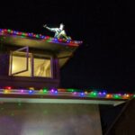 November - Eric adjusting Christmas lights
