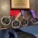 Eric's 4 medals + he wins the Championship's Most Valuable Athlete!