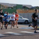 Alex running a 10k in Longmont