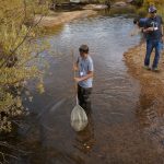 Eric doing stream ecology on the school fieldtrip