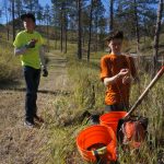 September - Alex planting trees in Nebraska with the Scouts
