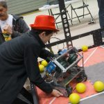 Alex setting up the school robot during a competiton
