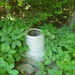 A beautiful setting for the outhouse (without the house) called the "grumper"