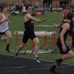 Alex handing off in the 4x800 meter relay