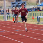 Eric winning his 100 meter heat